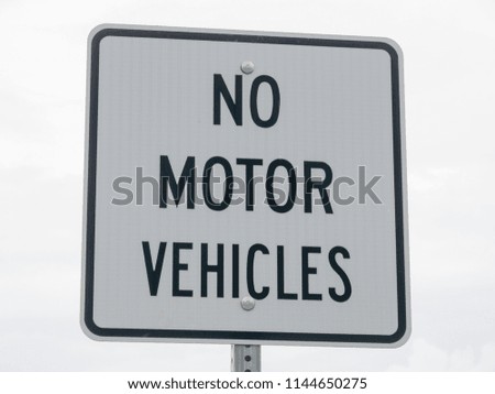 No motor vehicle sign in park
