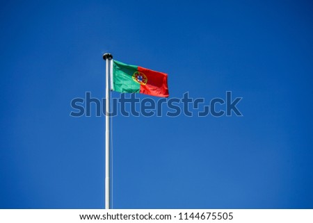 portugal national flag and blue sky