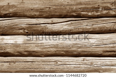 Old grunge wooden fence pattern in brown tone. Abstract background and texture for design.