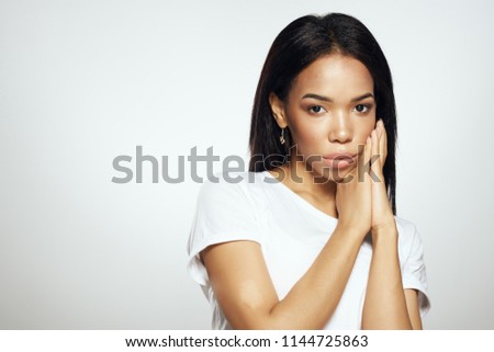    woman black on a light background portrait                            