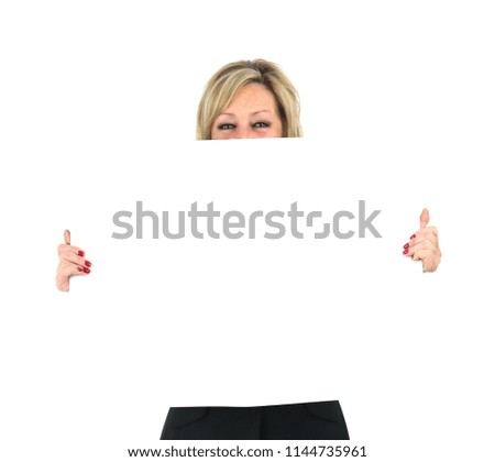 Blonde woman hiding behind a blank banner against a white background