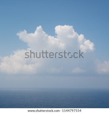 Cumulus clouds (heap clouds) above the sea.