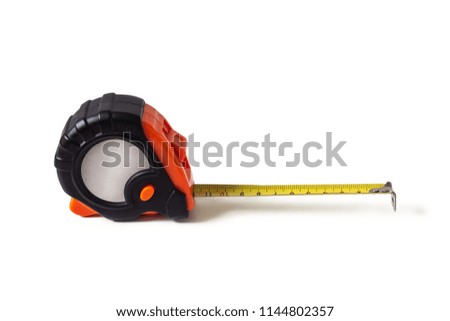 Orange-black tape measure with yellow extended ruler. Construction measuring tool isolated on white background