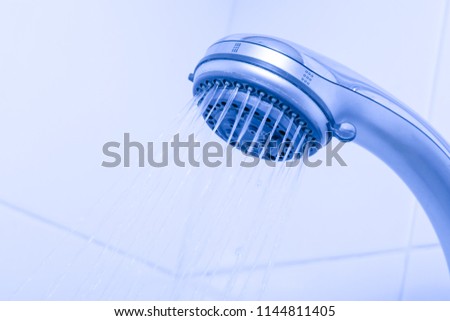 Head shower while running water. Close up