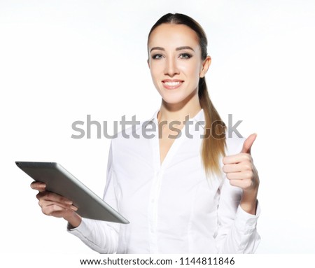 Attractive businnes woman  using tablet showing thumbs up. Woman with tablet pc, isolated on white background