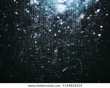 Abstract background. Used Steel, Carbon, Glass and Water. A light source of light, blur and soft shadow complement the composition. Matrix concept.