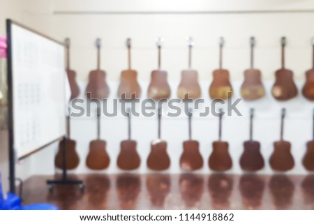 Blur image of guitar classroom.