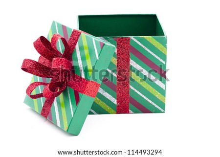 View of empty green Christmas gift box over white background.
