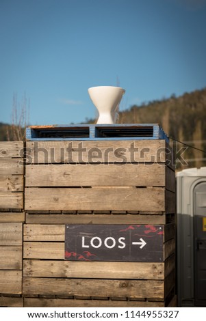 outdoor toilet sign