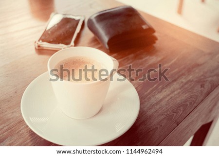 hot coffee cup on table, vintage color, relax time, morning time
