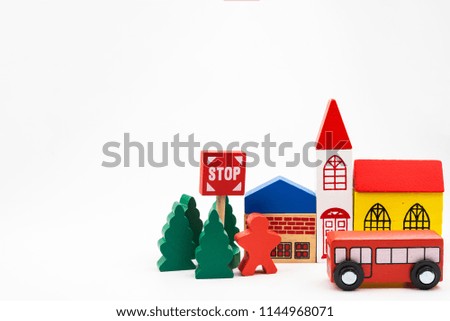 Road traffic with wooden toy cars in the town on white background, safety and traffic regulations concept, backgrounds.Transportation system concept