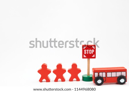 Road traffic with wooden toy cars in the town on white background, safety and traffic regulations concept, backgrounds.Transportation system concept