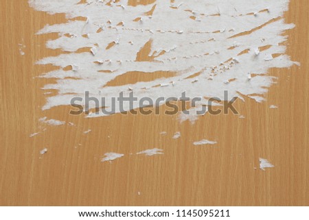 ripped torn paper on wooden background