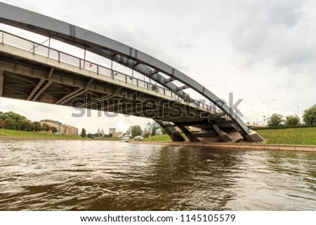 The Mindaugas Bridge is a bridge in Vilnius, Lithuania. It crosses Neris River and connects Zirmunai elderate with the Old Town of Vilnius. The bridge was named after Mindaugas, King of Lithuania.