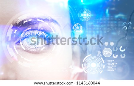 Face of an attractive woman with HUD on it. A futuristic background. Concept of hi tech. Toned image double exposure Elements of this image furnished by NASA