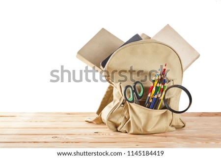 School satchel with office supplies. Education concept 