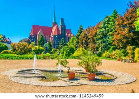 Church of the Holy Cross and St Bartholomew viewed from the university botanical garden in Wroclaw, Poland
