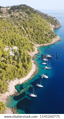 Aerial drone bird's eye view photo of iconic medieval castle in picturesque colorful traditional fishing village of Assos in island of Cefalonia, Ionian, Greece