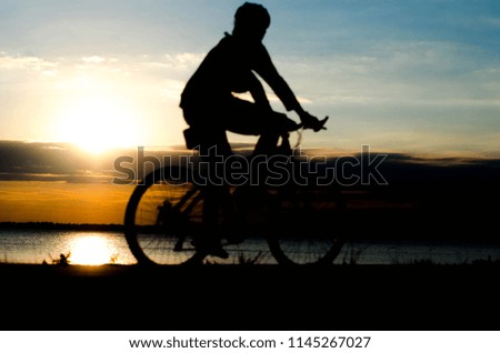 He was cycling for exercise in the evening.