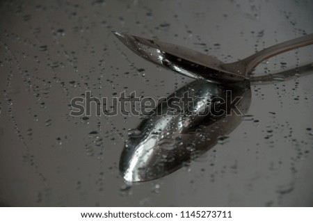 Spoon Water Reflection