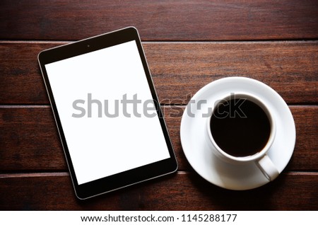 Tablet and black coffee in the morning Workday 