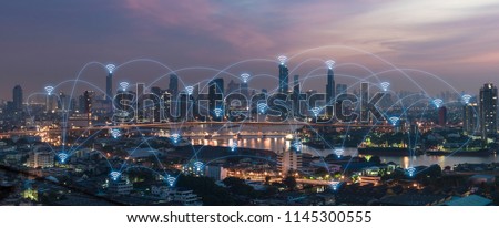 Social media connection by wireless telecommunication technology with cityscape background Royalty-Free Stock Photo #1145300555