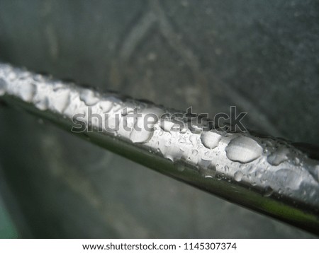 water drop on metal bar.