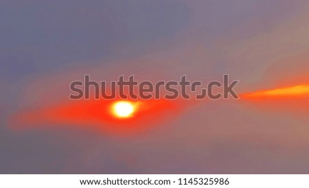 the setting sun in the bright clouds