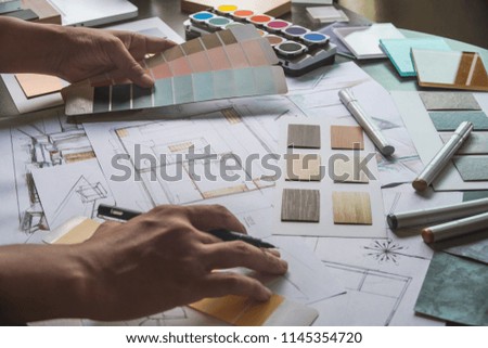 Architect designer Interior creative working hand drawing sketch plan blue print selection material color samples art tools Design Studio