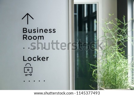 modern cozy business room locker room signage