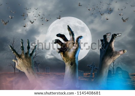 zombie hand sticking out of the ground Halloween background