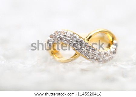Diamond ring infinity symbol
