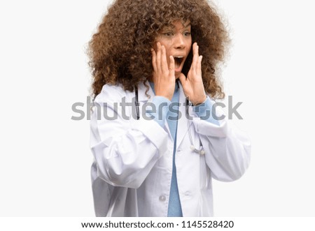 African american doctor woman, medical professional working stressful keeping hands on head, terrified in panic, shouting