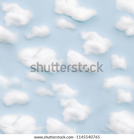 The background of sky and clouds In shades of pastel blue tones.