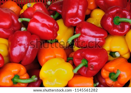 A variety of colored bell peppers  Royalty-Free Stock Photo #1145561282