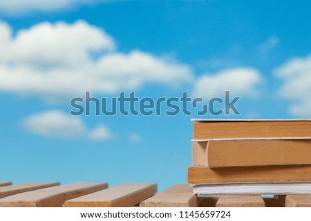 Stack books on wooden