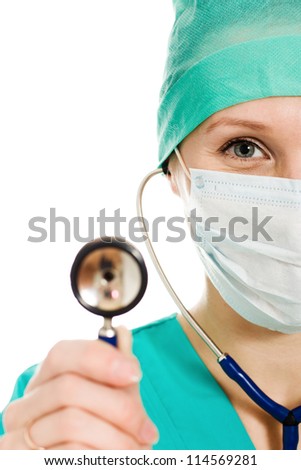 Female surgeon with a stethoscope in hand on a white background.