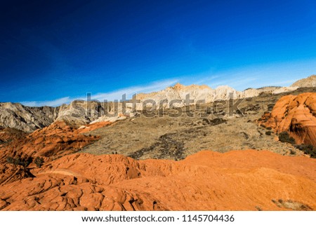 Red and white sandstone with evidence of ancient volcanic lava flows near St. George Utah