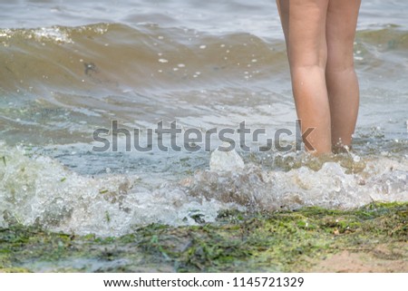 Legs Walking, Jumping and Splashing in Lake Water