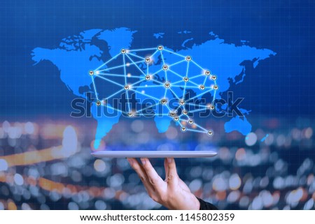 hands holding digital tablets touching brain with network connections, world map innovative Big data ,(internet of things) iot,ai technology in science ,intelligent life and communication concept