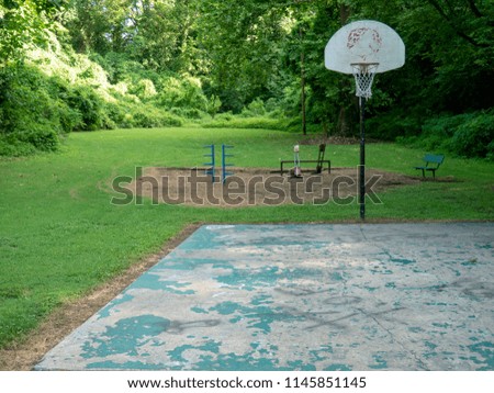 Small Basketball Court in Disrepair