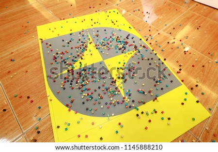 small dice game, sample space dice on  yellow background.