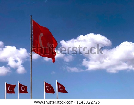 Turkish Flag Waving in Blue Sky