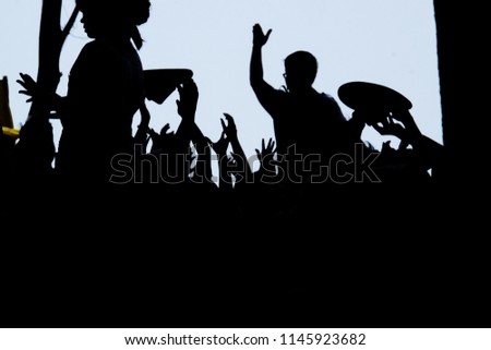 silhouette of crowd