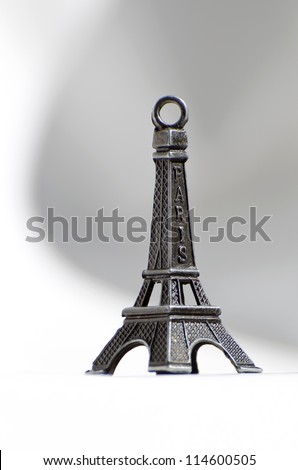 Eiffel tower lower view on neutral background