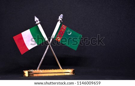 Italy and Turkmenistan table flag with black Background