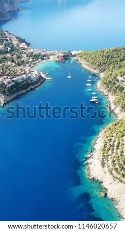 Aerial drone bird's eye view photo of iconic medieval castle in picturesque colorful traditional fishing village of Assos in island of Cefalonia, Ionian, Greece
