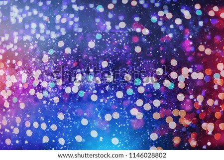 abstract blurred of blue and silver glittering shine bulbs lights background:blur of Christmas wallpaper decorations concept.