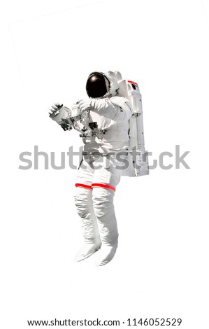 Astronaut in spacesuit close up isolated on white background. Spaceman in outer space. Elements of this image furnished by NASA Royalty-Free Stock Photo #1146052529