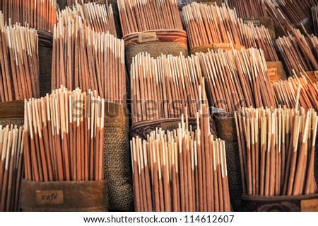 Various flavors of incense for sale.
